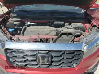 2023 Honda Passport EX-L with VIN 5FNYF8H57PB007264, listed as a Copart auction lot 48942955 with 18,013 mi miles and Salvage Title. Bid and sale history available at DreamBid. Image 12.