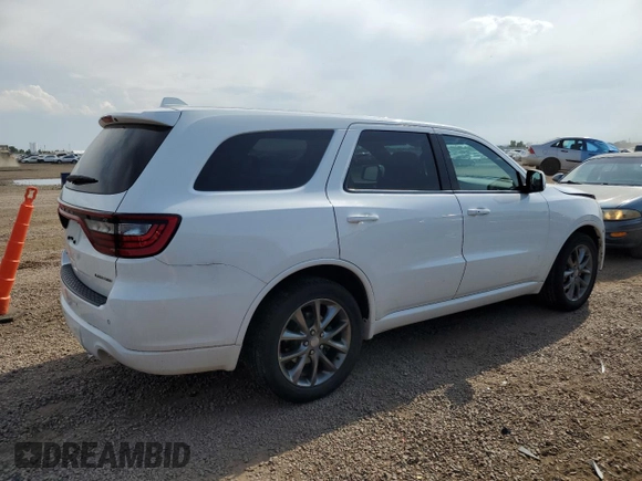 2014 Dodge Durango Limited with VIN 1C4RDJDG7EC599249, listed as a Copart auction lot 65560865 with 93,049 mi miles and Salvage title. Bid and sale history available at DreamBid. Image 3.