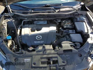 2014 Mazda CX-5 Touring with VIN JM3KE2CY8E0356881, listed as a Copart auction lot 53051005 with 271,257 mi miles and Clean Title. Bid and sale history available at carsss.com. Image 12.