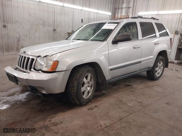 2009 Jeep Grand Cherokee Laredo with VIN 1J8GR48KX9C516873, listed as a IAAI auction lot 41610781 with 199,246 mi miles. Bid and sale history available at carsss.com. Image 17.