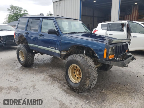 2000 Jeep Cherokee with VIN 1J4FF48S7YL209729, listed as a Copart auction lot 53647685 with 268,552 mi miles and Salvage title. Bid and sale history available at DreamBid. Image 4.