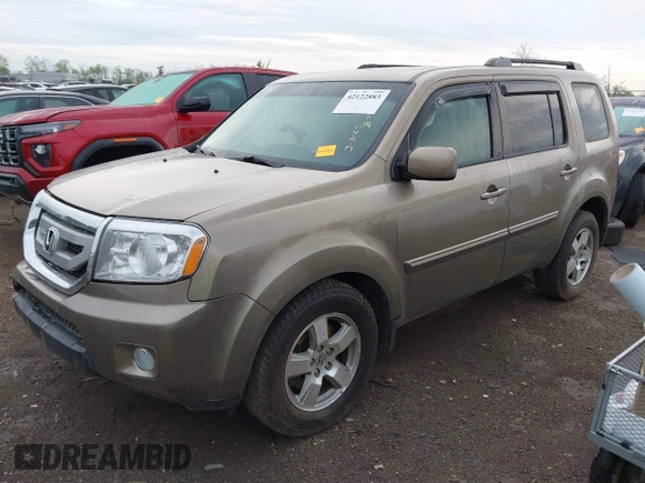 2011 Honda Pilot EX-L with VIN 5FNYF4H51BB076050, listed as a IAAI auction lot 42122883 with 143,288 mi miles and . Bid and sale history available at carsss.com. Image 18.