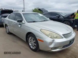 2003 Lexus ES with VIN JTHBF30G736004651, listed as a IAAI auction lot 42082023 with 221,653 mi miles. Bid and sale history available at carsss.com. Image 1.