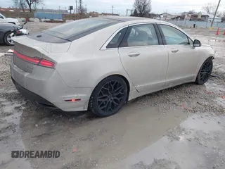 2016 Lincoln MKZ with VIN 3LN6L2J90GR604048, listed as a IAAI auction lot 41190815 with 46,121 mi miles and . Bid and sale history available at DreamBid. Image 4.