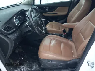 2019 Buick Encore Essence with VIN KL4CJGSM5KB738932, listed as a Copart auction lot 83087444 with 59,162 mi miles and Salvage Title. Bid and sale history available at DreamBid. Image 7.