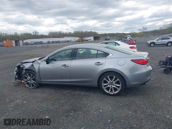 2014 Mazda 6 i Touring with VIN JM1GJ1V64E1147549, listed as a IAAI auction lot 42041025 with 124,400 mi miles and . Bid and sale history available at DreamBid. Image 14.