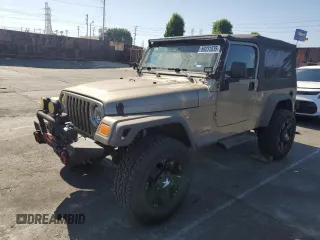 2005 Jeep Wrangler Unlimited with VIN 1J4FA44S05P328442, listed as a Copart auction lot 59231835 with 171,297 mi miles and Salvage title. Bid and sale history available at DreamBid. Image 1.