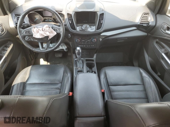 2019 Ford Escape Titanium z VIN 1FMCU9J93KUA51020, wystawiony jako Copart lot #60462495 z przebiegiem 59 998 mil mil oraz Szkoda całkowita • Salvage title. Historia ofert i sprzedaży dostępna na DreamBid. Obrazek 8.