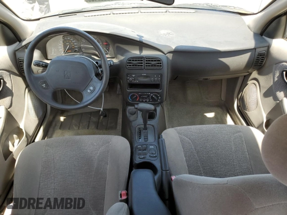 2000 Saturn SL with VIN 1G8ZK5271YZ184701, listed as a Copart auction lot 61598135 with 123,309 mi miles and Salvage title. Bid and sale history available at DreamBid. Image 8.