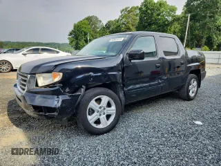 2013 Honda Ridgeline RTL with VIN 5FPYK1F50DB014582, listed as a Copart auction lot 60501015 with 180,314 mi miles and Salvage title. Bid and sale history available at DreamBid. Image 1.