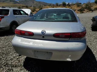 1996 Mercury Sable LS z VIN 1MELM53S4TG634577, wystawiony jako Copart lot #61707733 z przebiegiem 76 781 mil mil oraz Szkoda całkowita • Salvage title. Historia ofert i sprzedaży dostępna na DreamBid. Obrazek 6.