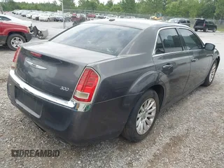 2013 Chrysler 300 with VIN 2C3CCAAG4DH588190, listed as a IAAI auction lot 42476895 with 224,837 mi miles and . Bid and sale history available at DreamBid. Image 4.