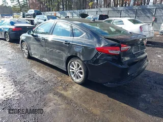 2020 Ford Fusion SE z VIN 3FA6P0LU4LR158954, wystawiony jako IAAI lot #41474425 z przebiegiem 76 966 mil mil oraz . Historia ofert i sprzedaży dostępna na DreamBid. Obrazek 3.