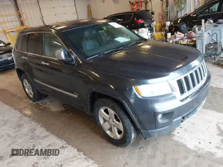2012 Jeep Grand Cherokee Limited z VIN 1C4RJFBTXCC241047, wystawiony jako IAAI lot #42416921 z przebiegiem 243 928 mil mil oraz . Historia ofert i sprzedaży dostępna na DreamBid. Obrazek 1.