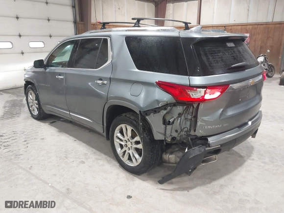 2018 Chevrolet Traverse High Country with VIN 1GNEVKKW1JJ156538, listed as a IAAI auction lot 41670997 with 99,345 mi miles. Bid and sale history available at carsss.com. Image 3.