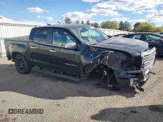 2022 GMC Canyon 4WD Denali with VIN 1GTG6EEN5N1133658, listed as a Copart auction lot 75592304 with 34,715 mi miles and Salvage Title. Bid and sale history available at carsss.com. Image 4.