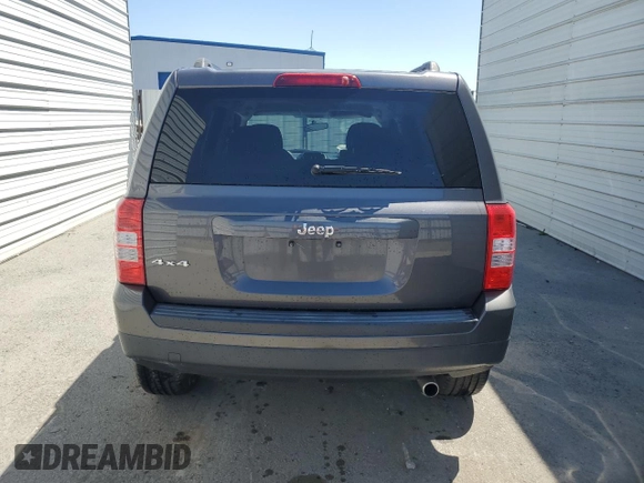 2014 Jeep Patriot Sport with VIN 1C4NJRBB7ED886081, listed as a Copart auction lot 52406205 with 61,002 mi miles and Salvage Title. Bid and sale history available at DreamBid. Image 6.