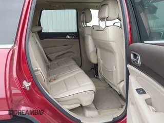 2015 Jeep Grand Cherokee High Altitude with VIN 1C4RJECG7FC884942, listed as a IAAI auction lot 41852796 with 110,454 mi miles. Bid and sale history available at carsss.com. Image 8.