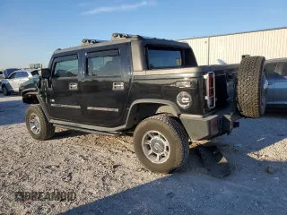 2005 Hummer H2 SUT with VIN 5GRGN22U85H109003, listed as a Copart auction lot 76557734 with 115,249 mi miles and Salvage Title. Bid and sale history available at carsss.com. Image 2.