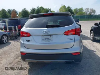 2016 Hyundai Santa Fe z VIN 5XYZTDLB0GG338313, wystawiony jako IAAI lot #42103866 z przebiegiem 111 555 mil mil oraz . Historia ofert i sprzedaży dostępna na DreamBid. Obrazek 16.