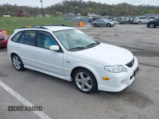 2003 Mazda Protege with VIN JM1BJ245031211396, listed as a IAAI auction lot 41903261 with 69,038 mi miles and . Bid and sale history available at DreamBid. Image 1.