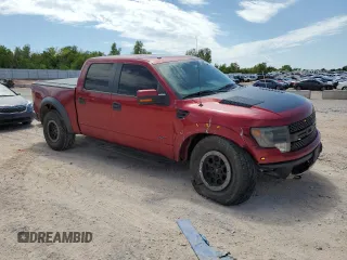 2014 Ford F-150 SVT Raptor with VIN 1FTFW1R60EFA69717, listed as a Copart auction lot 67408424 with 184,866 mi miles and Salvage Title. Bid and sale history available at carsss.com. Image 4.