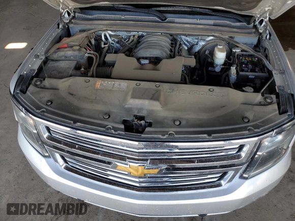2018 Chevrolet Suburban Premier with VIN 1GNSCJKC7JR104888, listed as a Copart auction lot 68027604 with 69,632 mi miles and Salvage title. Bid and sale history available at DreamBid. Image 12.