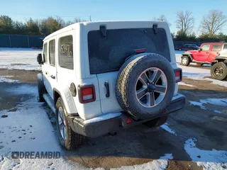 2021 Jeep Wrangler Unlimited Sahara with VIN 1C4HJXEG2MW827385, listed as a IAAI auction lot 41534476 with 29,489 mi miles and . Bid and sale history available at DreamBid. Image 3.