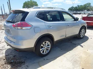 2015 Nissan Rogue SV with VIN 5N1AT2MTXFC849891, listed as a IAAI auction lot 41964361 with 135,934 mi miles and . Bid and sale history available at carsss.com. Image 4.
