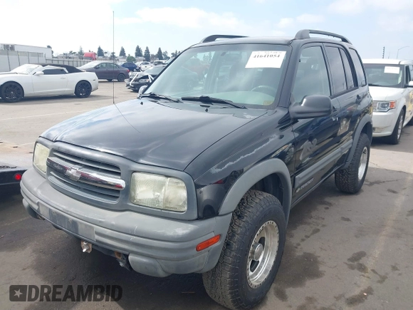 2003 Chevrolet Tracker ZR2 with VIN 2CNBJ734536931923, listed as a IAAI auction lot 41641054 with 111,247 mi miles and . Bid and sale history available at DreamBid. Image 2.