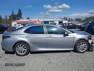 2023 Toyota Camry LE z VIN 4T1C11AK3PU172750, wystawiony jako IAAI lot #42338023 z przebiegiem 33 727 mil mil oraz . Historia ofert i sprzedaży dostępna na DreamBid. Obrazek 13.
