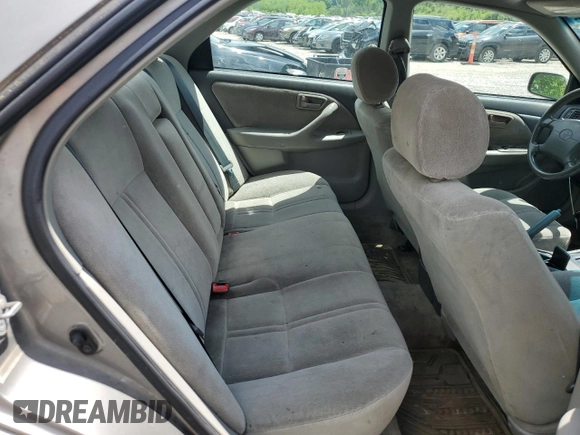 2000 Toyota Camry CE z VIN 4T1BG22K5YU013891, wystawiony jako Copart lot #56693255 z przebiegiem 248 922 mil mil oraz Szkoda całkowita • Salvage title. Historia ofert i sprzedaży dostępna na DreamBid. Obrazek 10.