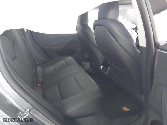 2025 Tesla Model 3 Long Range with VIN 5YJ3E1EBXSF912475, listed as a IAAI auction lot 41449488 with 3,100 mi miles. Bid and sale history available at carsss.com. Image 8.