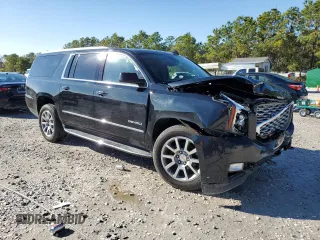 2020 GMC Yukon XL Denali with VIN 1GKS1HKJ0LR175976, listed as a Copart auction lot 85873314 with 51,049 mi miles and Salvage Title. Bid and sale history available at carsss.com. Image 4.