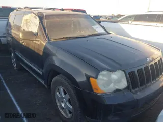 2009 Jeep Grand Cherokee Laredo with VIN 1J8GS48K49C536203, listed as a IAAI auction lot 41019376 with 1 mi miles. Bid and sale history available at carsss.com. Image 1.