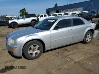 2005 Chrysler 300 with VIN 2C3JA43R15H171138, listed as a Copart auction lot 74354314 with 164,862 mi miles and Clean Title. Bid and sale history available at carsss.com. Image 1.