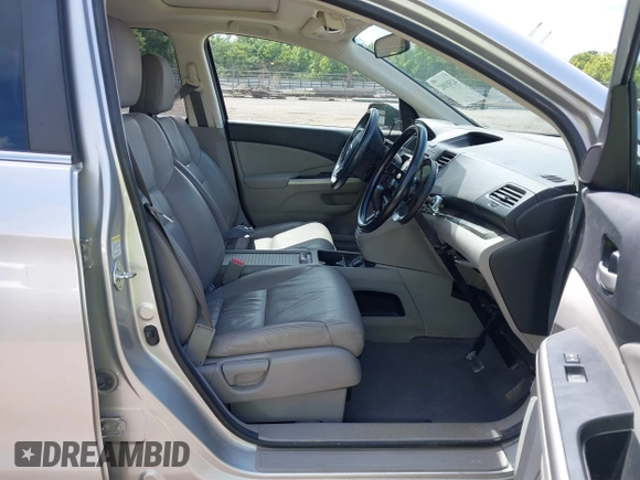 2013 Honda CR-V EX-L with VIN 2HKRM4H79DH640074, listed as a IAAI auction lot 42503002 with 86,309 mi miles and . Bid and sale history available at DreamBid. Image 5.