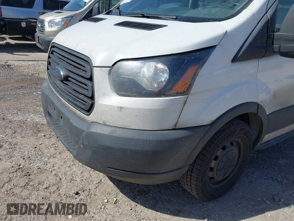 2018 Ford Transit with VIN 1FTYE1CMXJKA35806, listed as a IAAI auction lot 41652642 with 200,828 mi miles and . Bid and sale history available at DreamBid. Image 17.