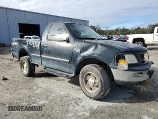 1998 Ford F-150 with VIN 1FTZF18W6WNA50479, listed as a Copart auction lot 42035055 with 125,861 mi miles and Salvage title. Bid and sale history available at DreamBid. Image 4.