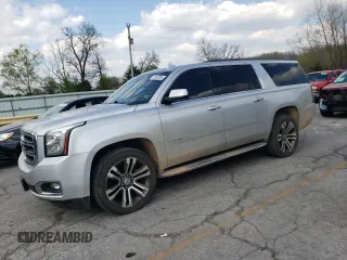 2017 GMC Yukon XL SLT with VIN 1GKS2GKCXHR195314, listed as a Copart auction lot 52600365 with 163,449 mi miles and Salvage title. Bid and sale history available at DreamBid. Image 1.