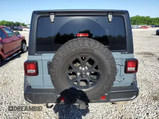 2024 Jeep Wrangler Sport S with VIN 1C4PJXDG2RW346671, listed as a Copart auction lot 57966375 with 9,430 mi miles and Salvage title. Bid and sale history available at DreamBid. Image 6.