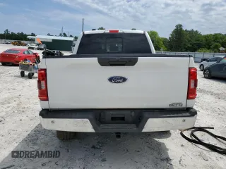 2023 Ford F-150 XL with VIN 1FTFW1E85PKG17275, listed as a Copart auction lot 57497155 with 34,379 mi miles and Salvage title. Bid and sale history available at DreamBid. Image 6.