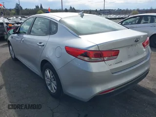 2017 Kia Optima LX with VIN 5XXGT4L39HG148760, listed as a IAAI auction lot 41889329 with 140,834 mi miles and . Bid and sale history available at DreamBid. Image 3.