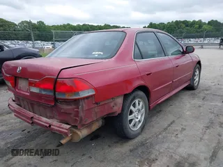 2002 Honda Accord EX z VIN 1HGCG56632A038404, wystawiony jako IAAI lot #42370161 z przebiegiem 262 308 mil mil oraz . Historia ofert i sprzedaży dostępna na DreamBid. Obrazek 4.