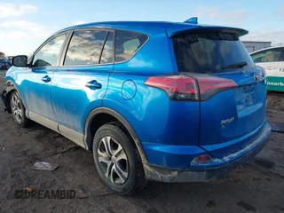 2018 Toyota RAV4 LE with VIN JTMBFREV4JJ717092, listed as a IAAI auction lot 41492235 with 127,643 mi miles. Bid and sale history available at carsss.com. Image 3.