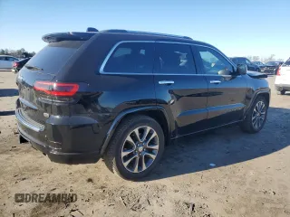 2017 Jeep Grand Cherokee Overland with VIN 1C4RJFCT7HC684746, listed as a Copart auction lot 83259314 with 106,848 mi miles and Salvage Title. Bid and sale history available at carsss.com. Image 3.