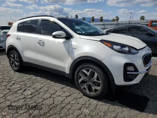 2020 Kia Sportage EX z VIN KNDPNCAC0L7805972, wystawiony jako Copart lot #52038825 z przebiegiem 65 794 mil mil oraz Szkoda całkowita • Salvage title. Historia ofert i sprzedaży dostępna na DreamBid. Obrazek 4.