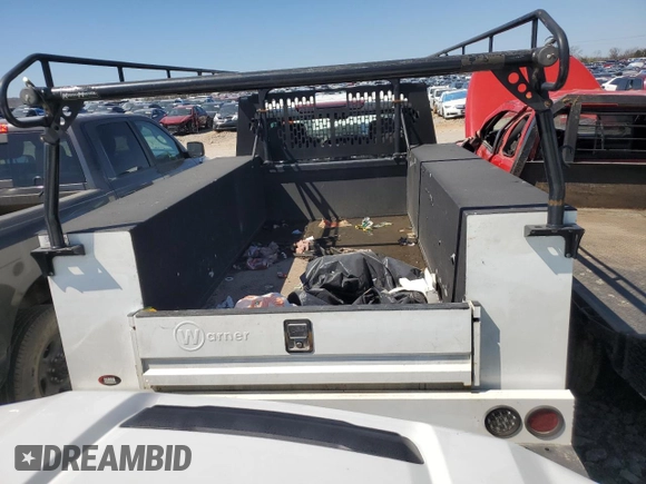 2022 Chevrolet Silverado 1500 with VIN 1GC2WLE7XNF219440, listed as a Copart auction lot 49656895 with 128,138 mi miles and Salvage Title. Bid and sale history available at DreamBid. Image 6.