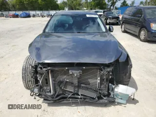 2017 Infiniti Q50 Premium z VIN JN1EV7APXHM732252, wystawiony jako Copart lot #50937795 z przebiegiem 109 219 mil mil oraz Szkody całkowita. Historia ofert i sprzedaży dostępna na DreamBid. Obrazek 5.