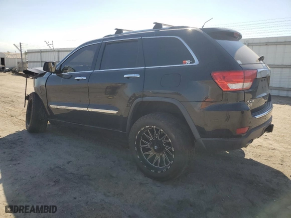 2013 Jeep Grand Cherokee Overland Summit with VIN 1C4RJFCT1DC635178, listed as a Copart auction lot 50613695 with 119,509 mi miles and Salvage Title. Bid and sale history available at carsss.com. Image 2.